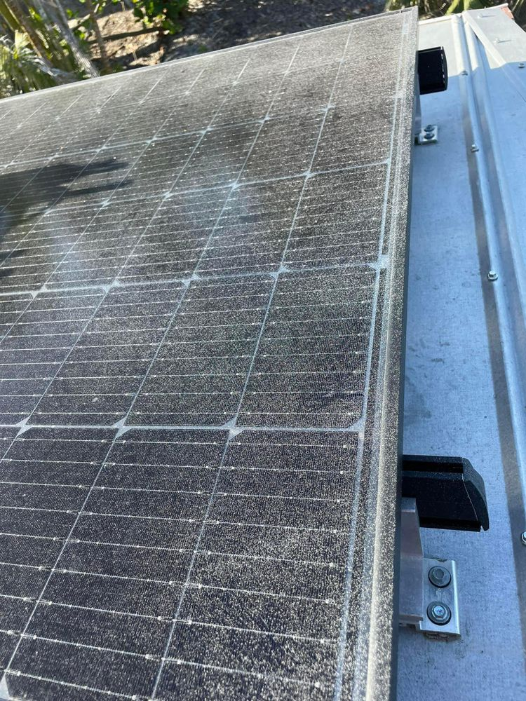 A close up of a solar panel on a roof.