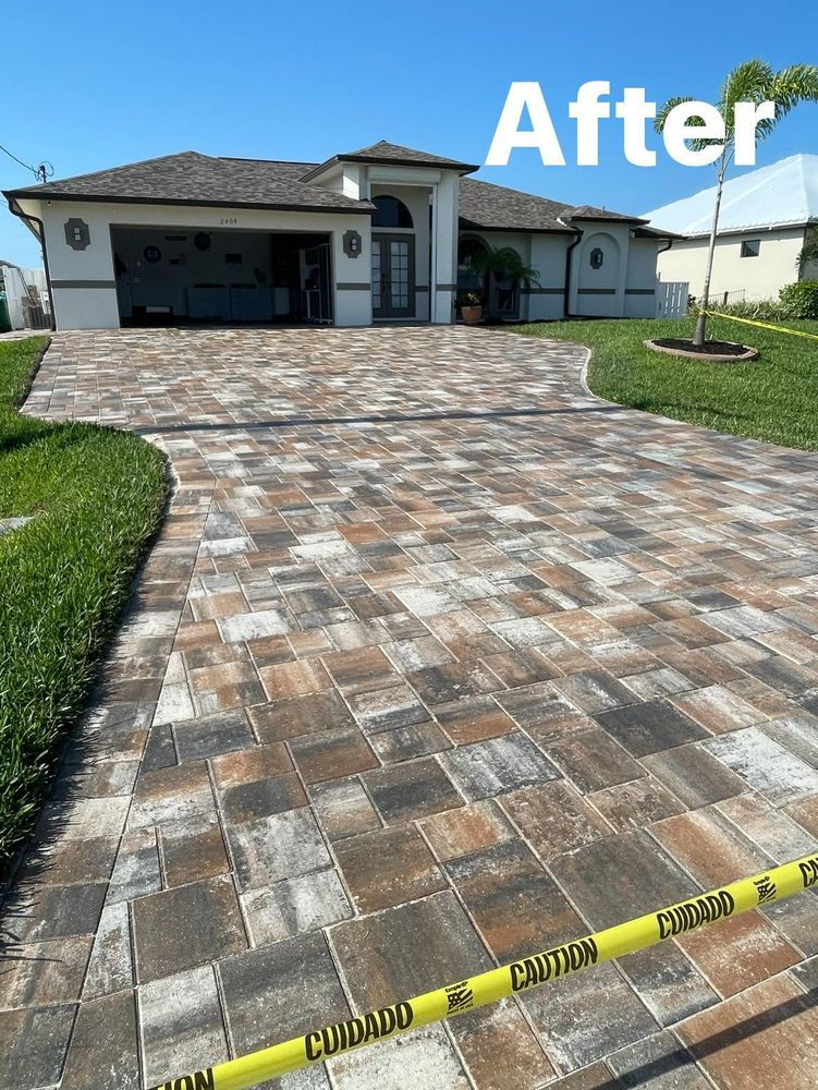 A picture of a driveway after being cleaned.