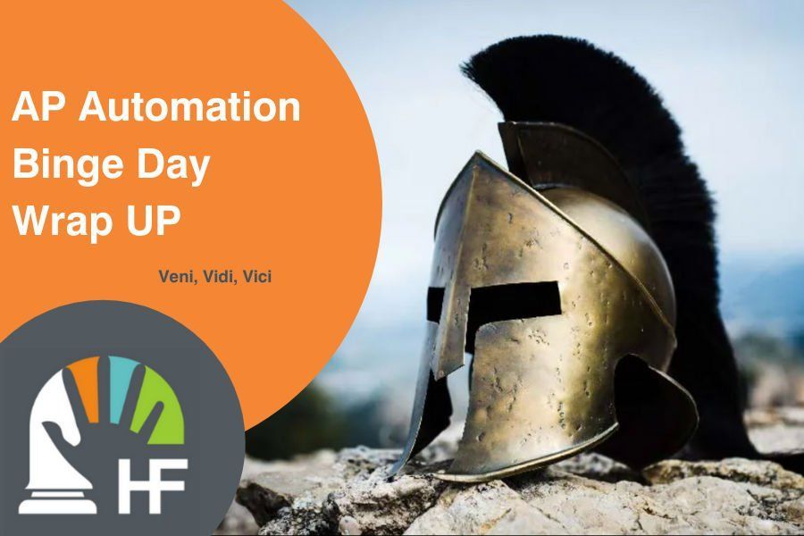 A spartan helmet sits on a rock in front of an orange circle that says ap automation binge day wrap up