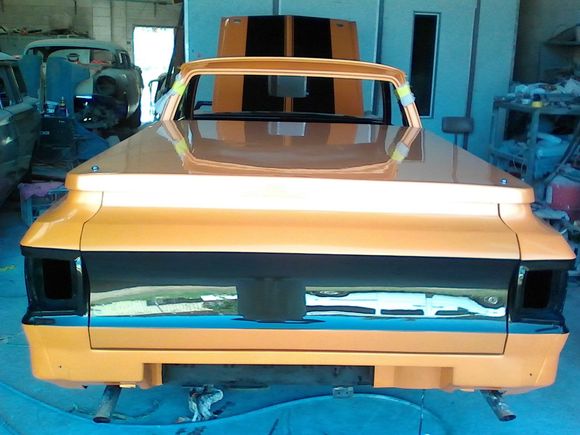 spray painting a car