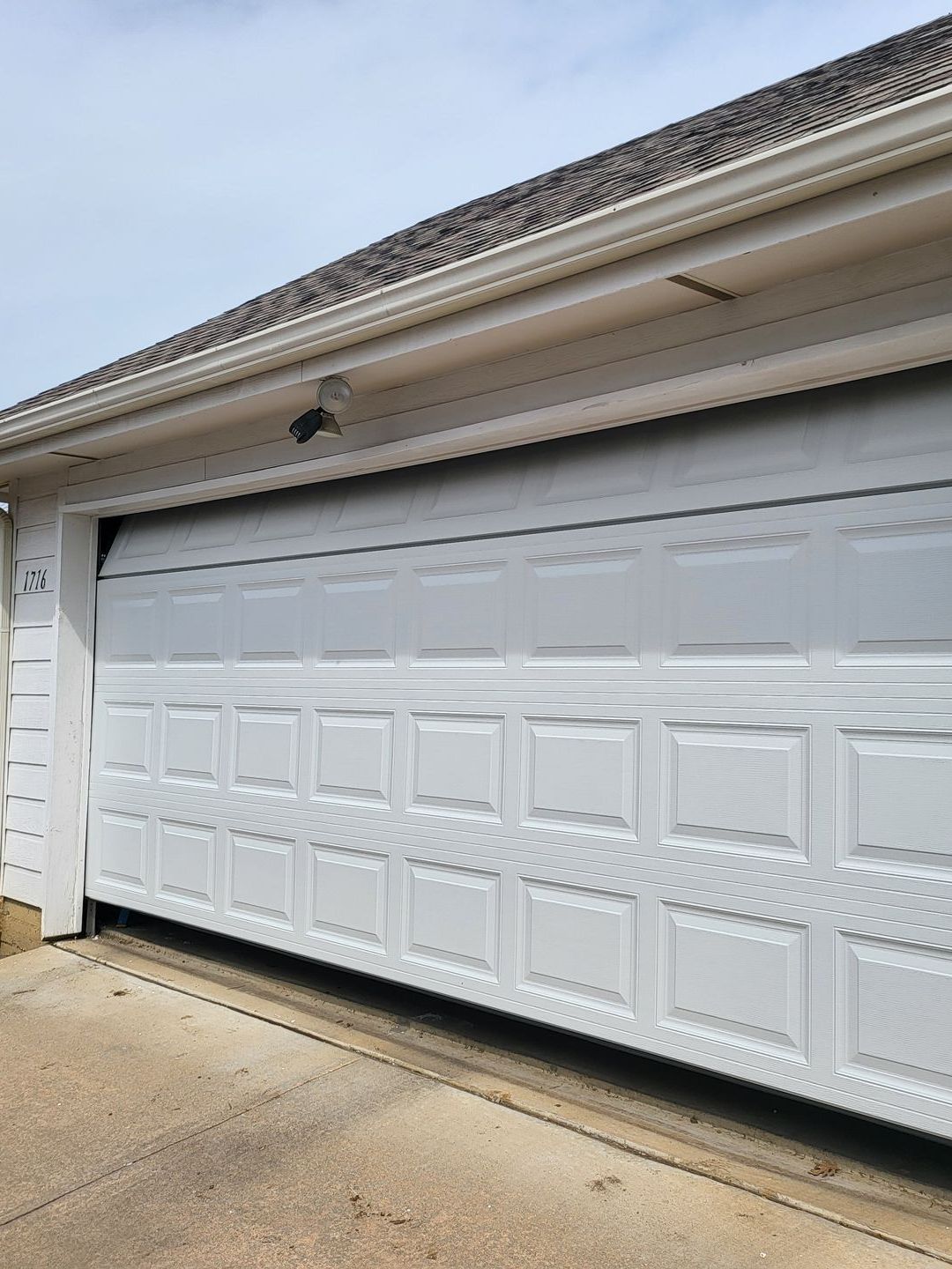 garage opening by itself - garage door repair