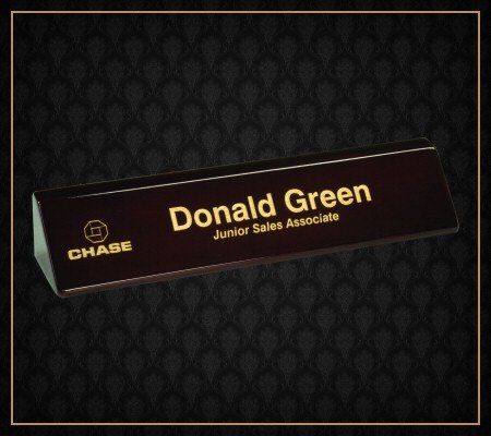 A wooden name plate for donald green