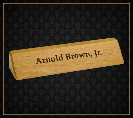 A wooden name plate for arnold brown jr.