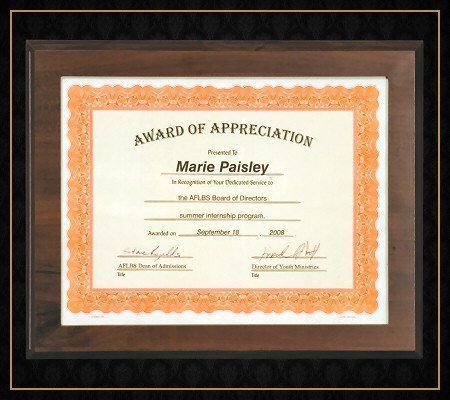 A framed award of appreciation for marie paisley