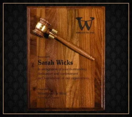 A wooden plaque that says sarah wicks on it