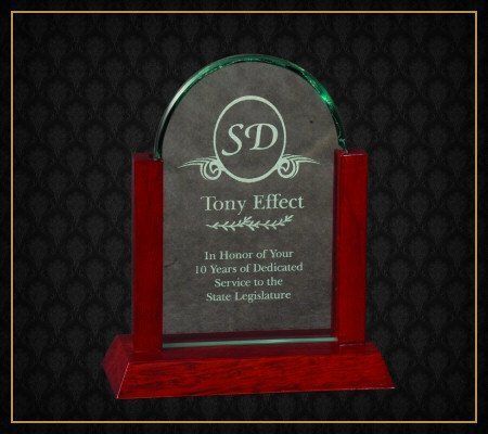 A glass plaque with the name tony effect on it