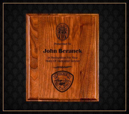 A wooden plaque that says john beranck on it