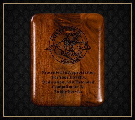 A wooden plaque presented in appreciation for your loyalty dedication and extended commitment to public service