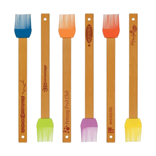 A bunch of different colored brushes on a white background