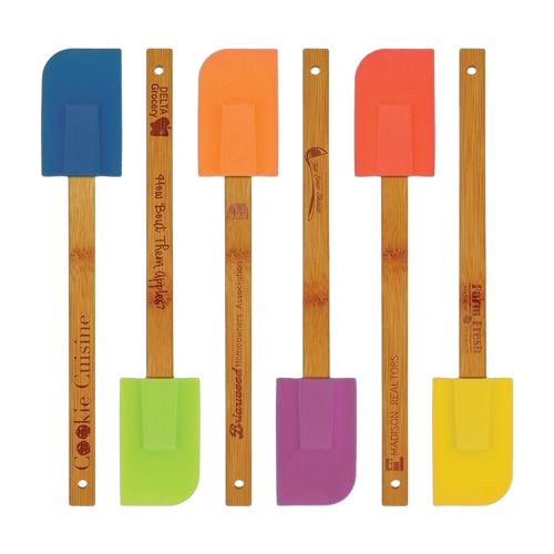 A set of colorful spatulas with bamboo handles