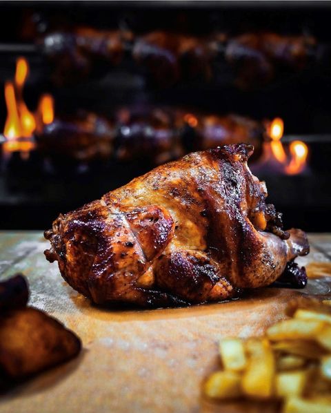 Close image of a fully grilled chicken — Palm Desert, CA — Mi Cultura