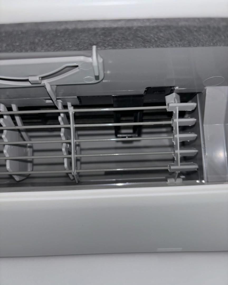 A Close up Of the Inside of An Air Conditioner— Staub Air in Garbutt, QLD