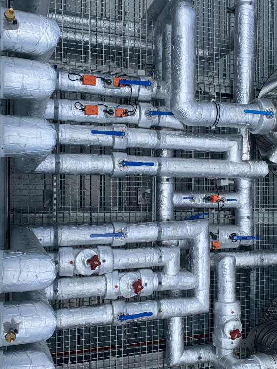 A Man Is Measuring with A Tape Measure — Staub Air in Garbutt, QLD