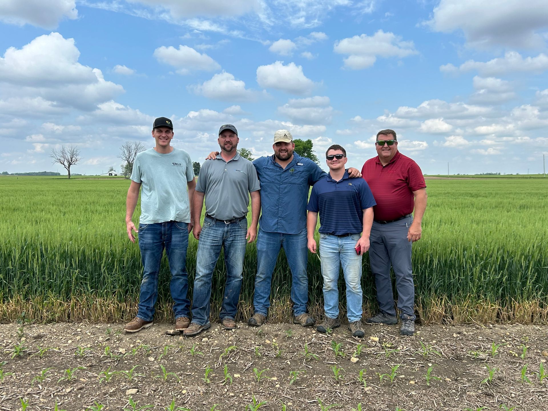 Welcome to Tri-Ag News! Becks sign in front of field.