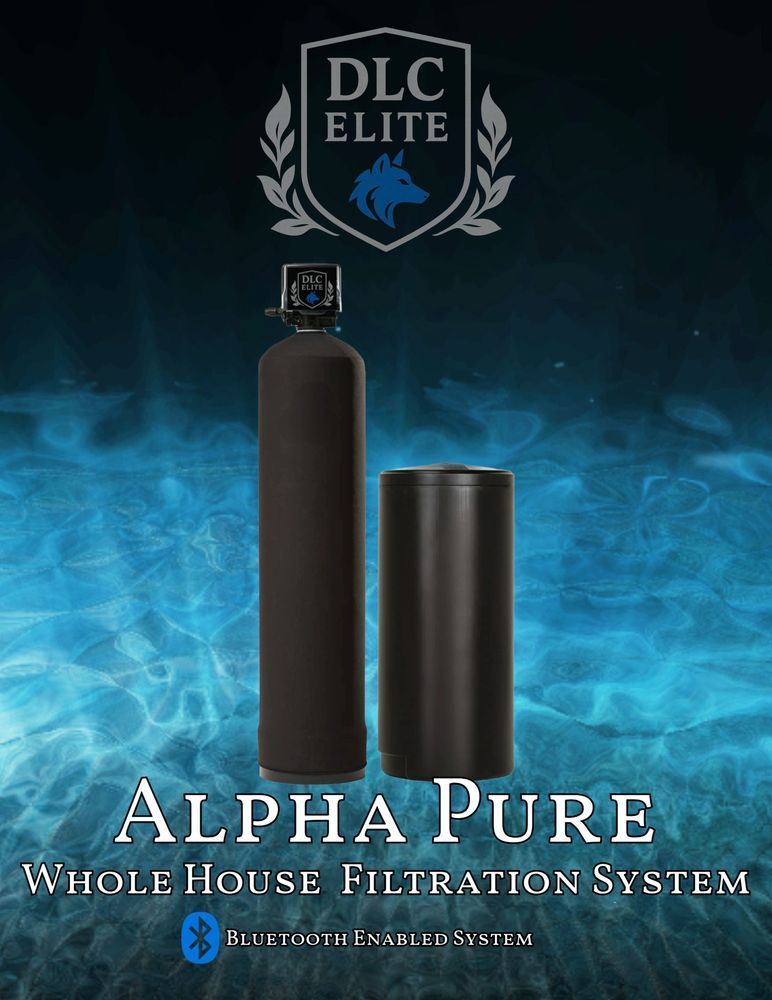 A reverse osmosis water filtration system installed under a dark cabinet.