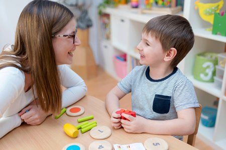 Daycare — Teacher and Student Smiling in Midlothian, IL Daycare — Teacher and Student Smiling in Midlothian, IL