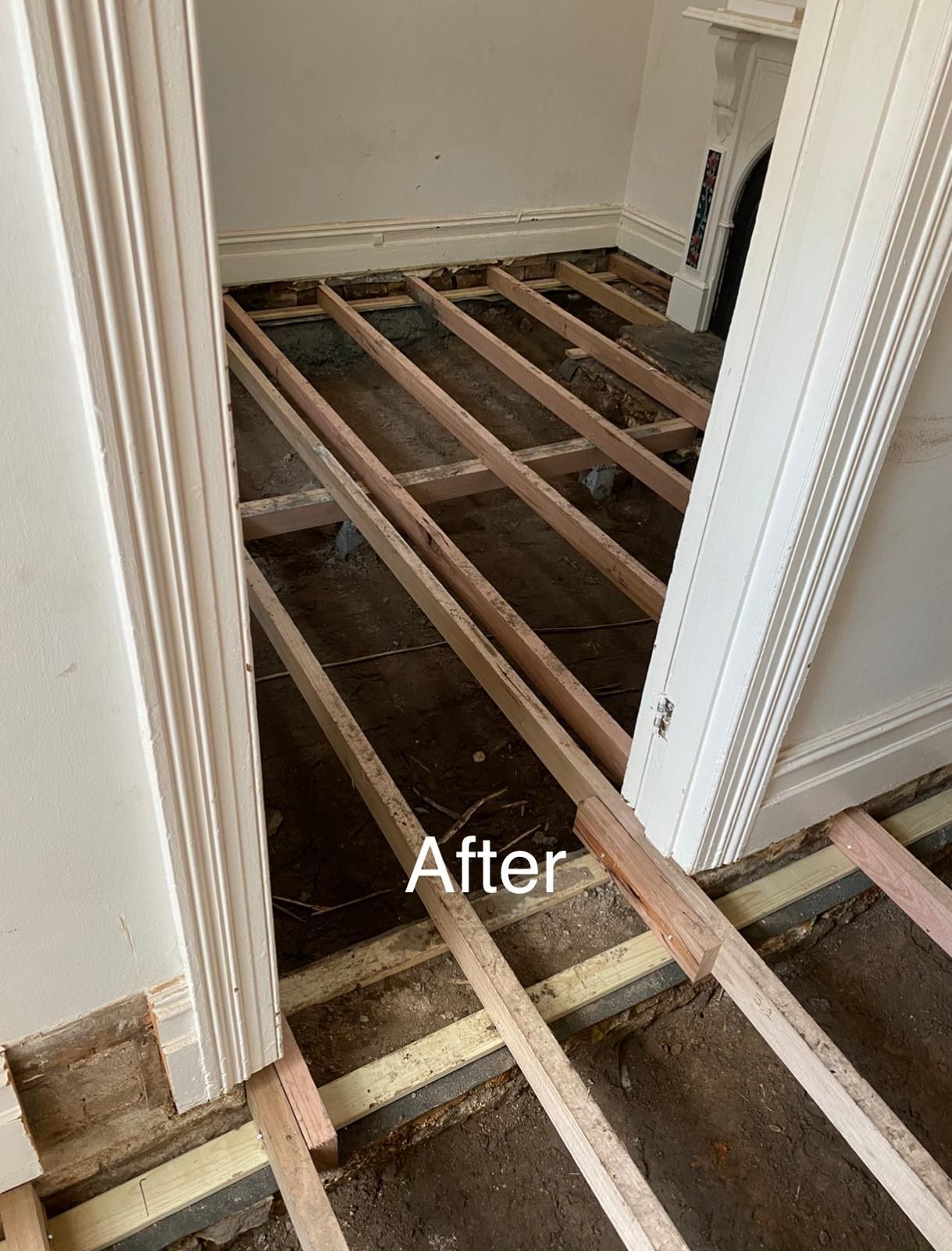 A picture of a wooden floor in a room.