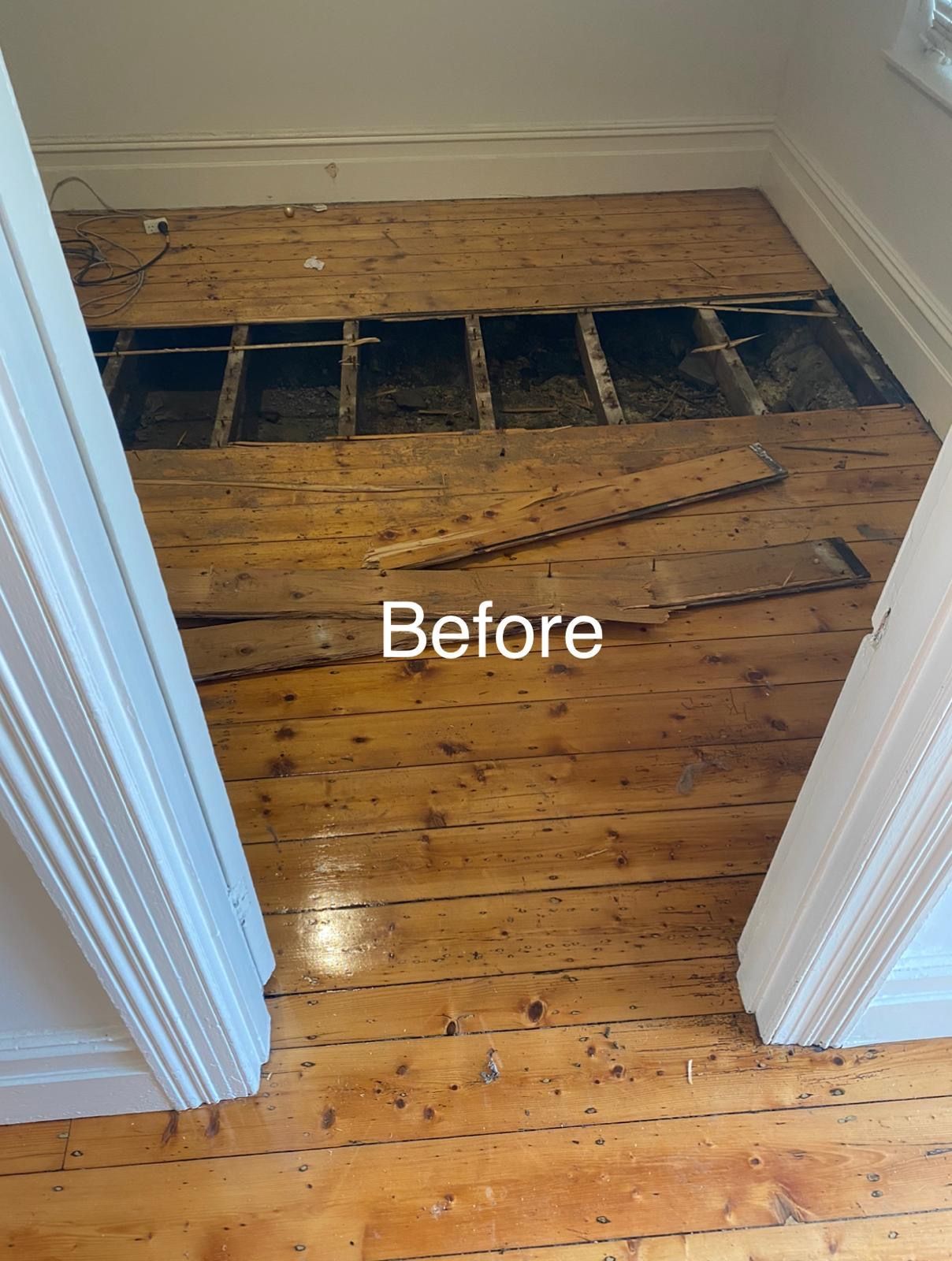 A before picture of a wooden floor in a room.