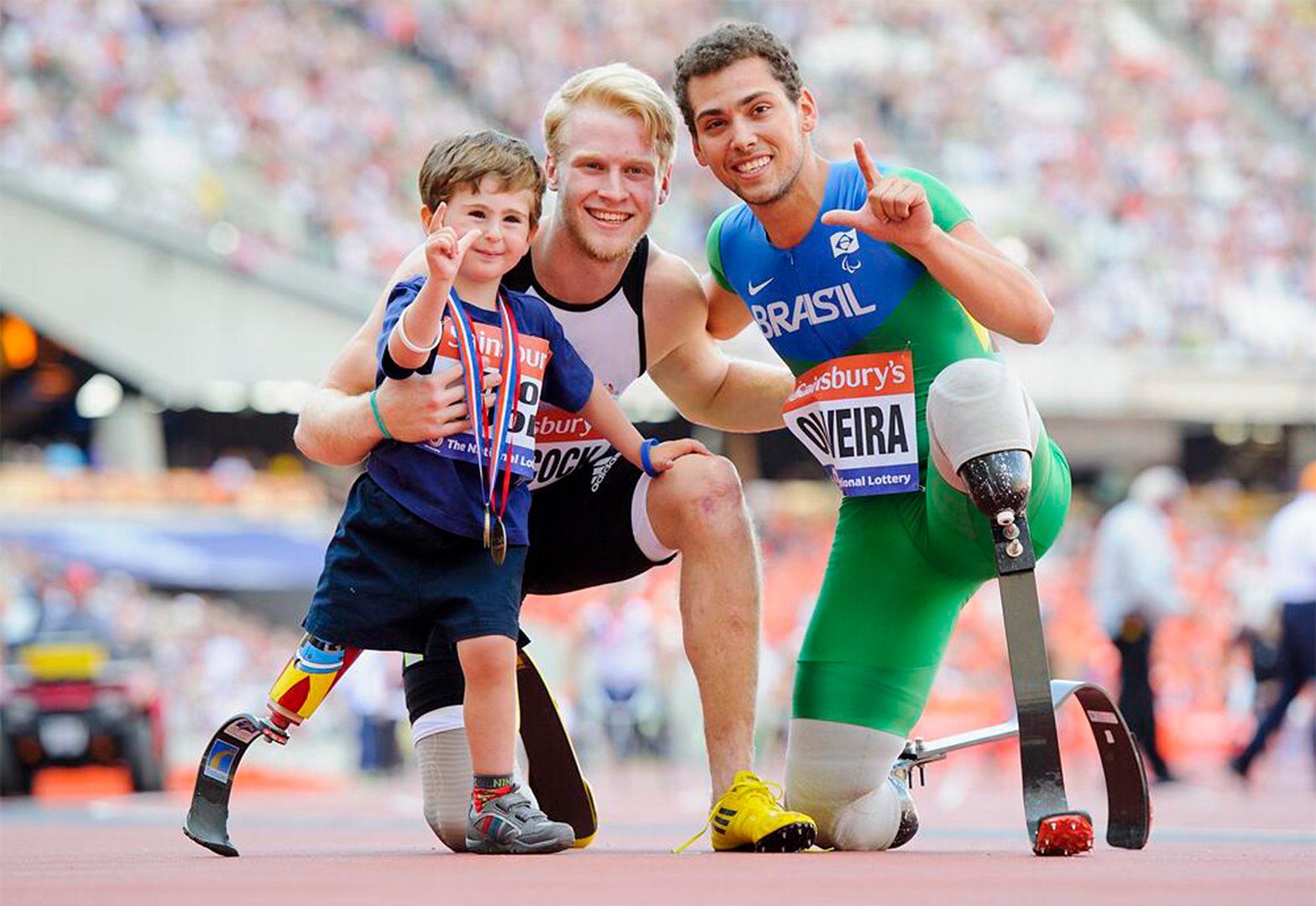 Rio Woolf with Jonnie Peacock and Alan Oliveira