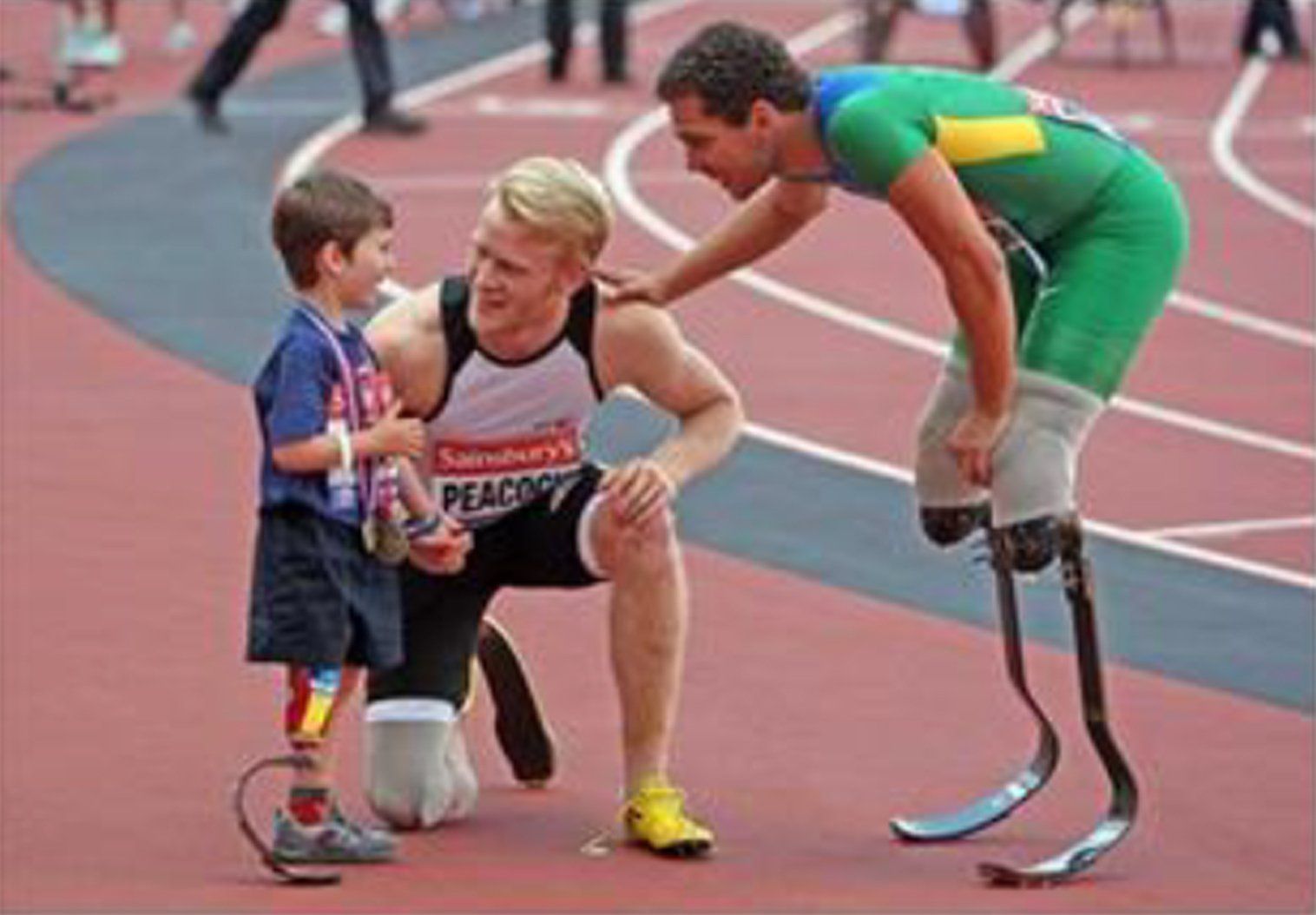 Rio Woolf with Jonnie Peacock and Alan Oliveira
