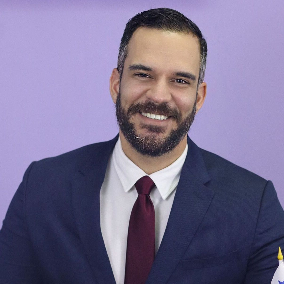Luis Arjona PTY Lawyers
(a man with a beard is wearing a suit and tie)