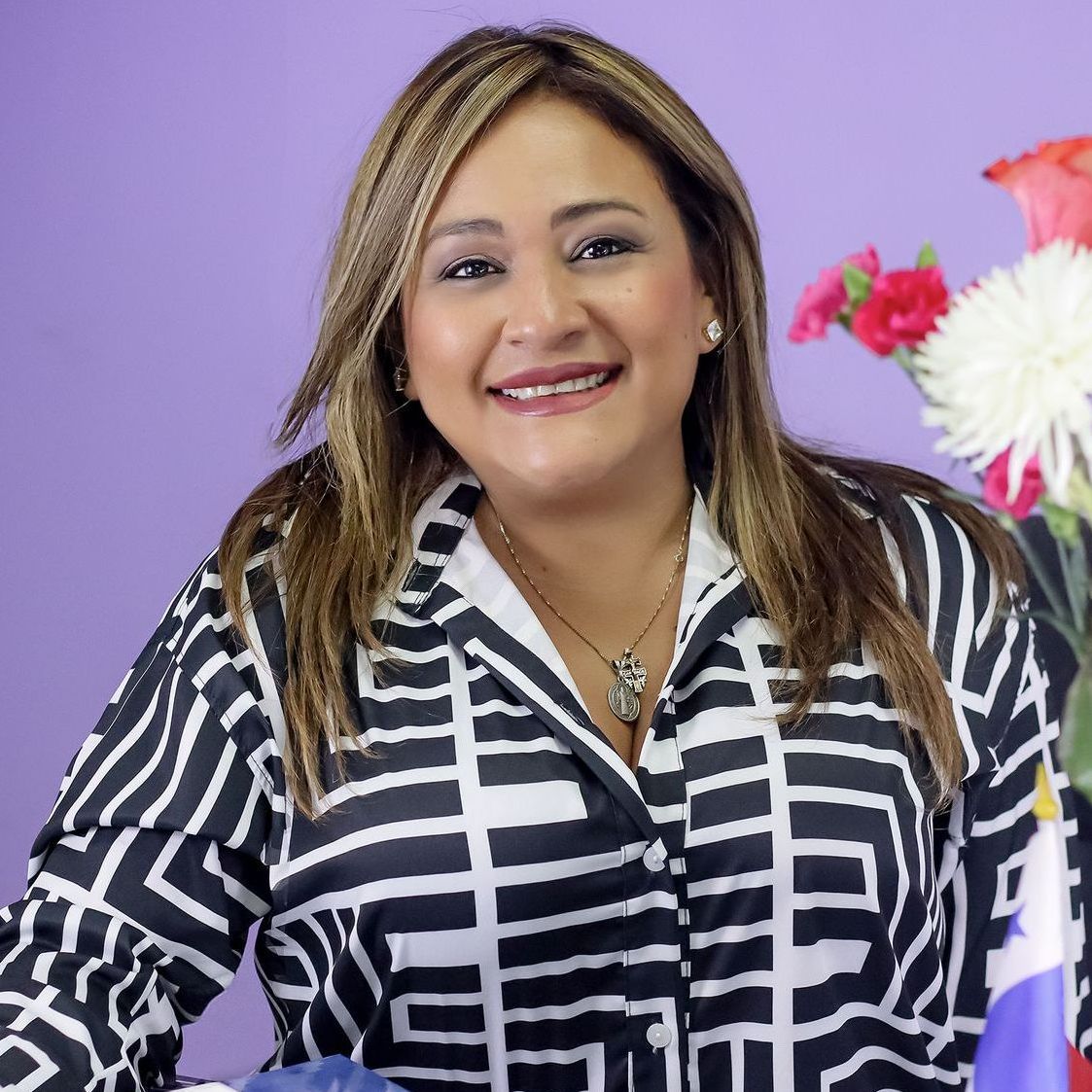 Tanya Coronado PTY Lawyers
(a woman wearing a black and white striped shirt is smiling)