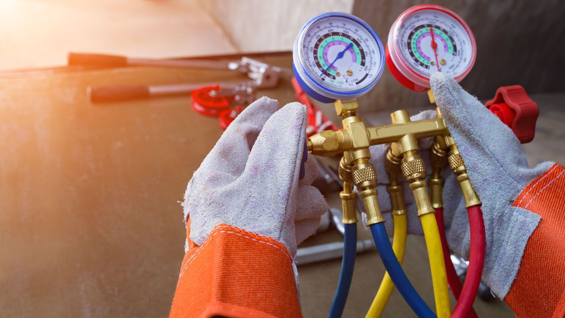 Hand Holding a Gauge — Kansas City, MO — Weir AC Inc.