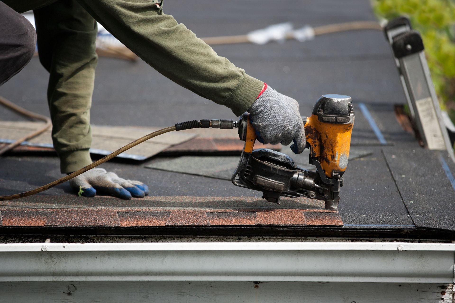 Man Is Drilling Roof with Proper Equipment | Dickinson, ND | Unleashed Contracting