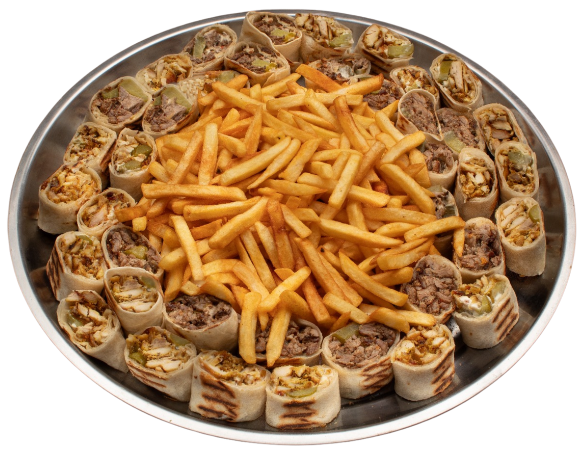 A plate of food with french fries on top of it on a white background.