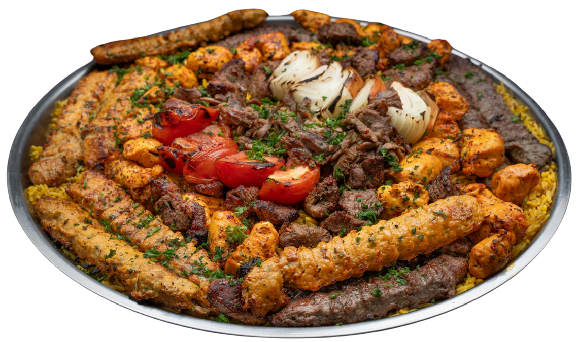 Party Platter A plate of food with meat and vegetables on a white background.