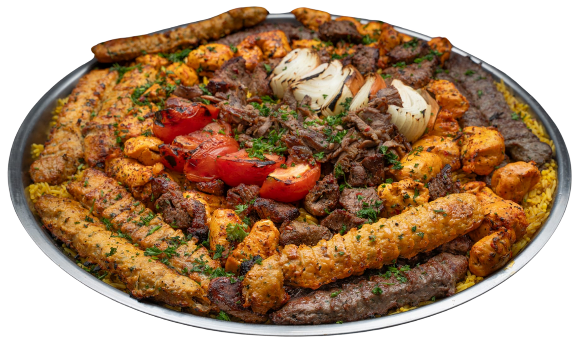 A plate of food with meat and vegetables on a white background.