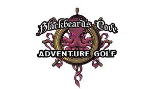 The logo for blackbeard 's cove adventure golf is a steering wheel with an octopus on it.