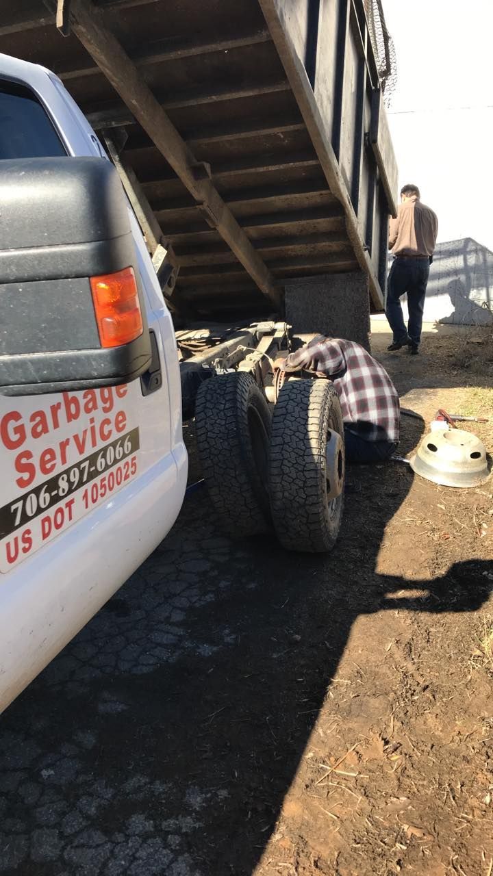 Side View Of Truck — Blairsville, GA — Tony’s Garbage LLC