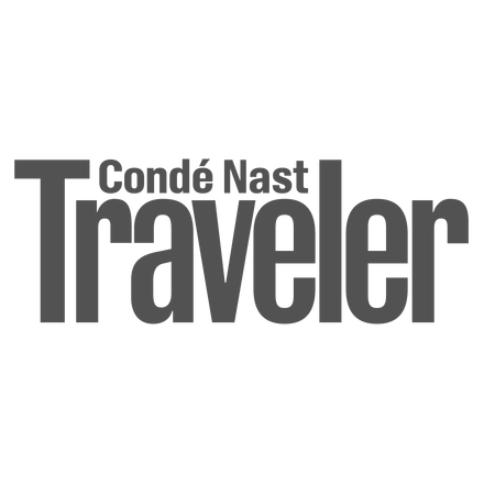 Conde Nast Traveler logo with dark grey text on a white background.
