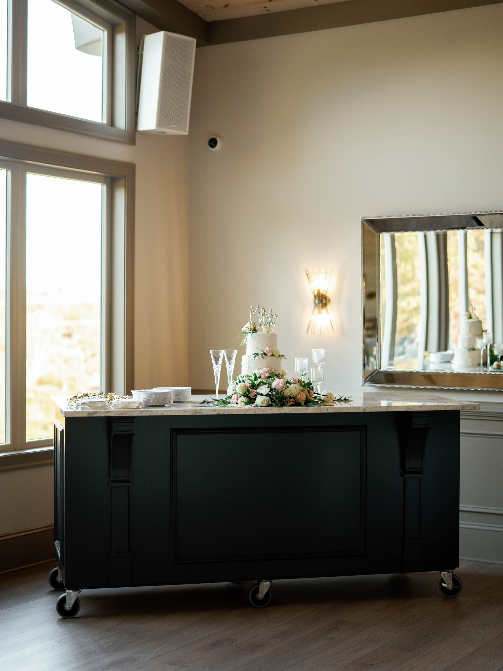 A table with a wedding cake on top of it