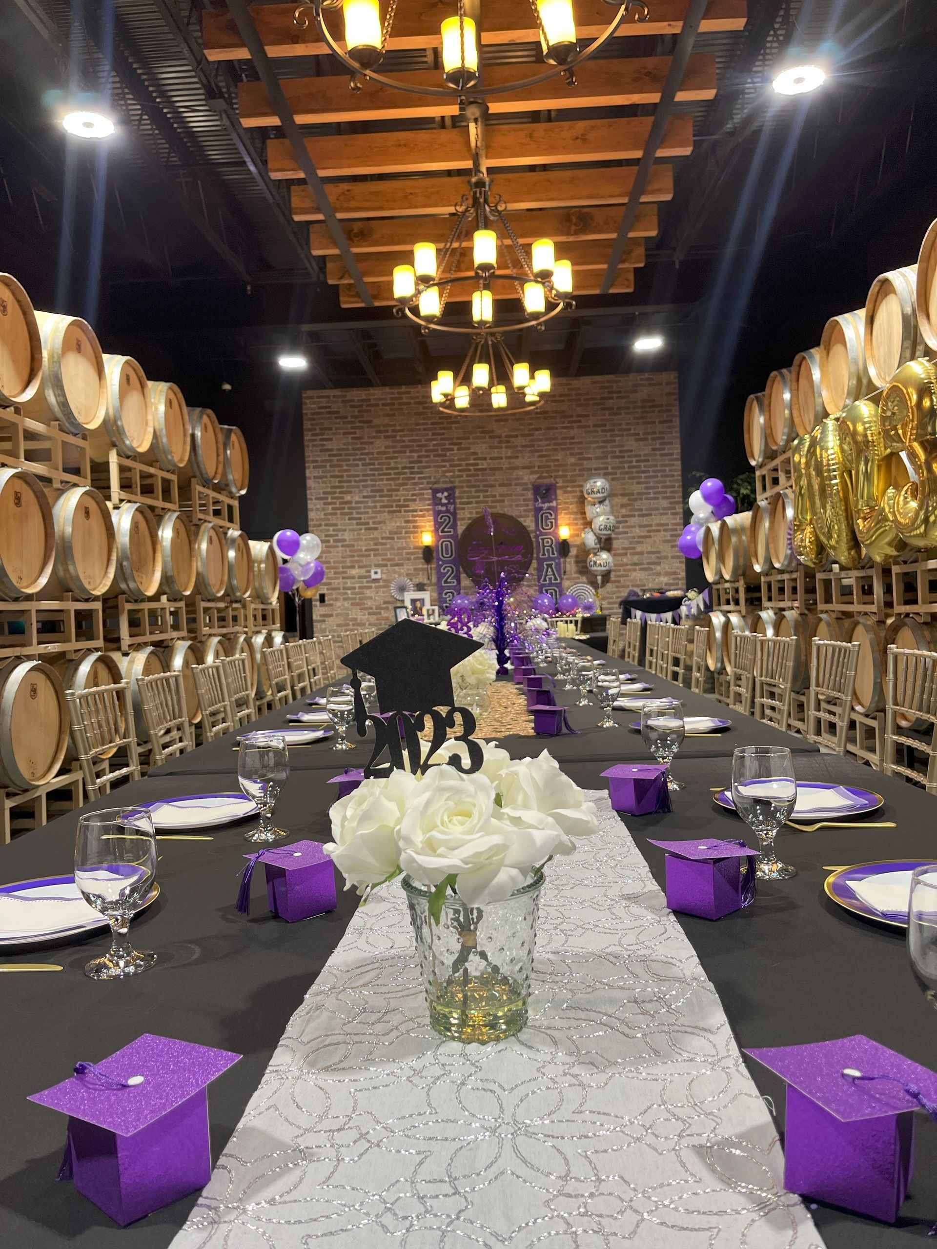 A long table set up for a graduation party