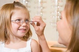 Girl Wearing Eyeglasses - Optical Services in Holden, MA