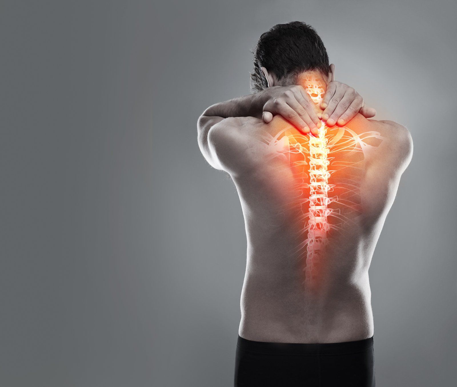 A man who needs spinal pain care in Salt Lake City, UT