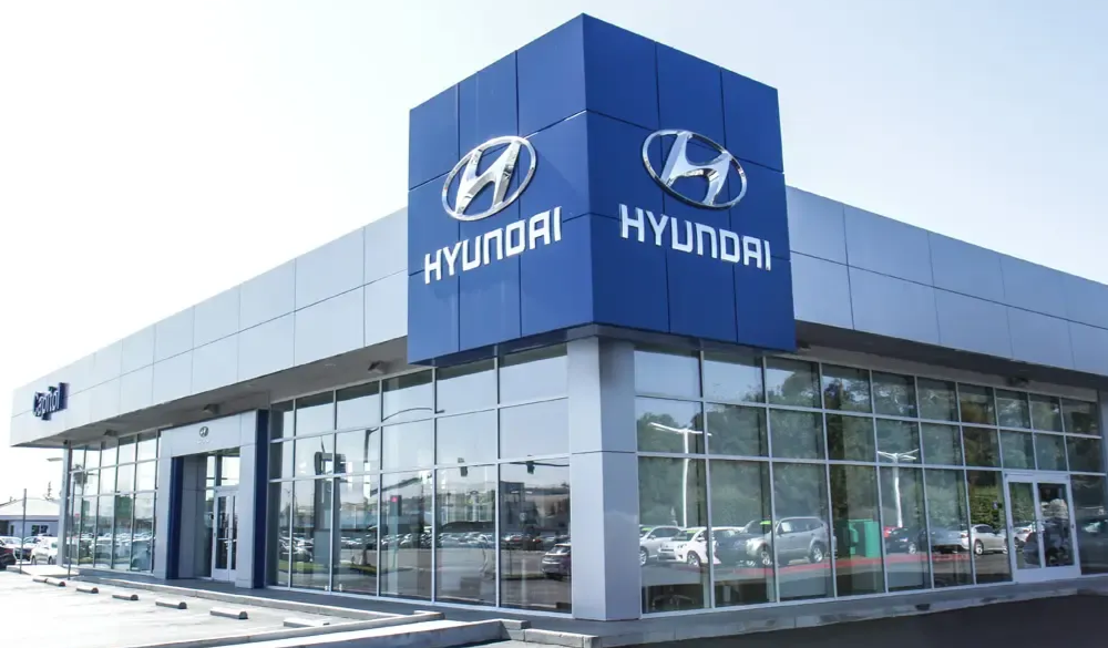 Hyundai dealership building with blue and white signage.