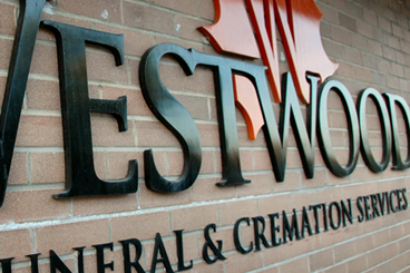 A sign for westwood funeral and cremation services