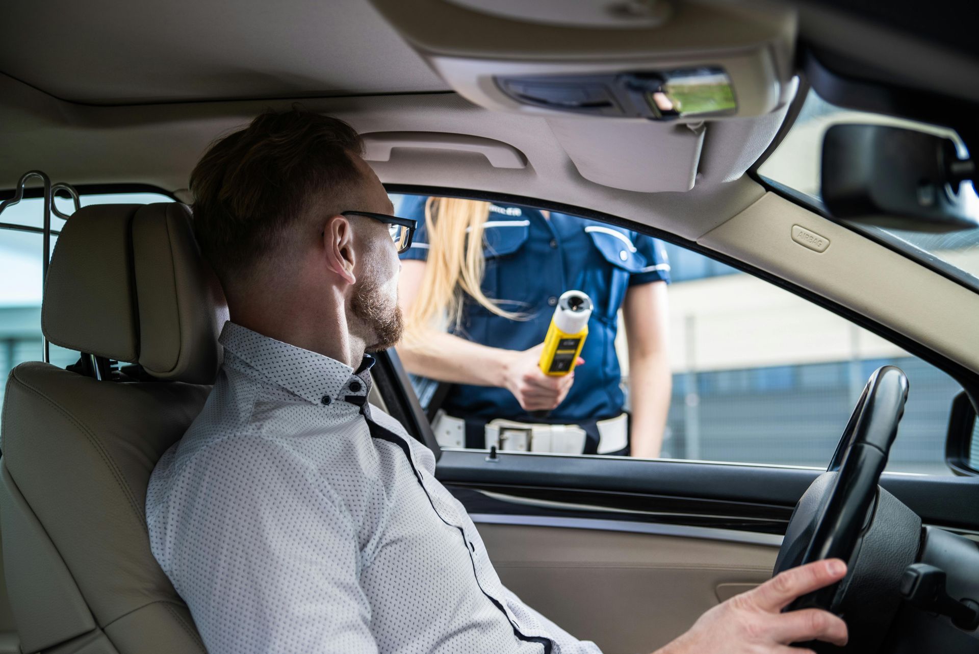 Man taking Breathalyzer 