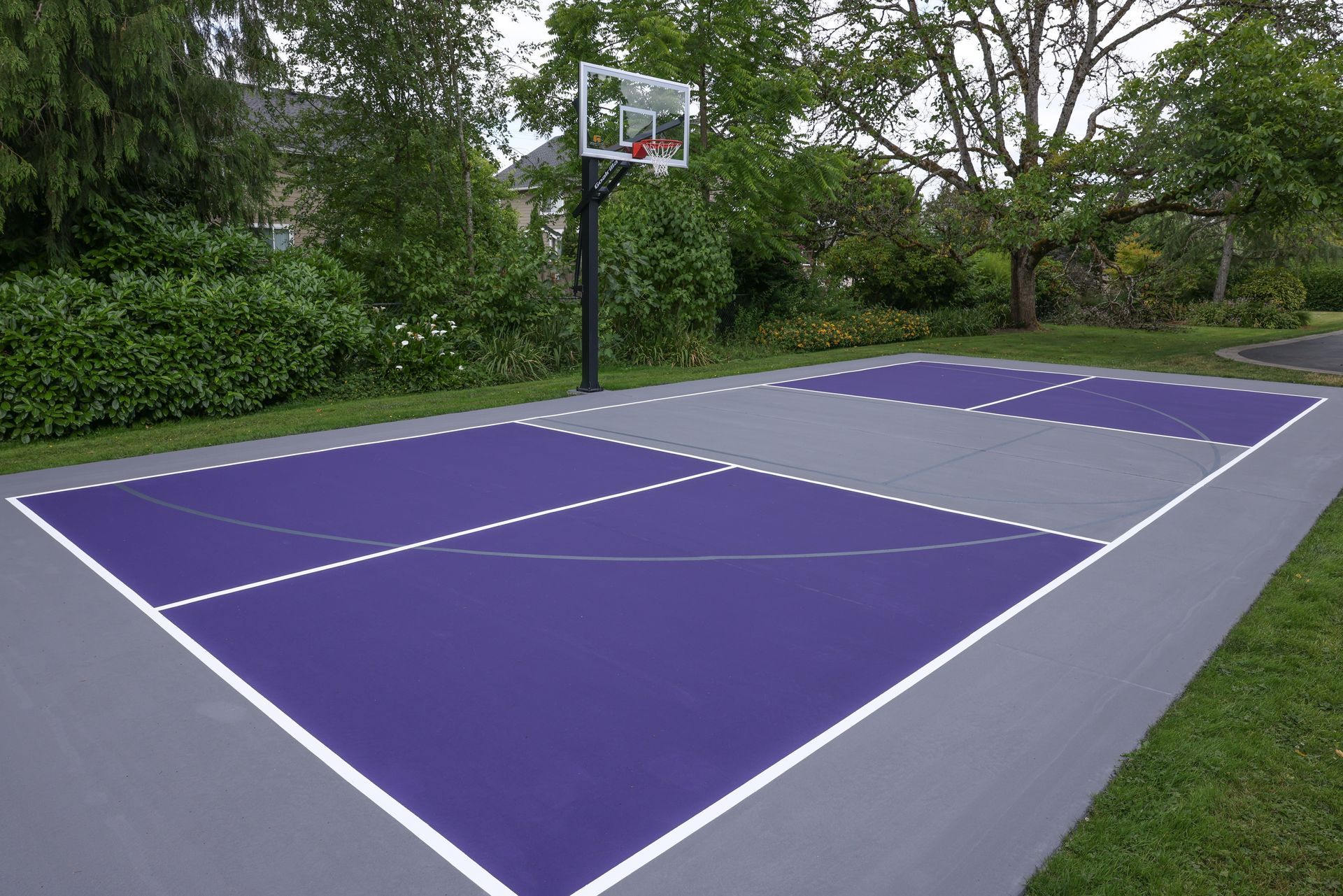 A man is standing on the side of a road.