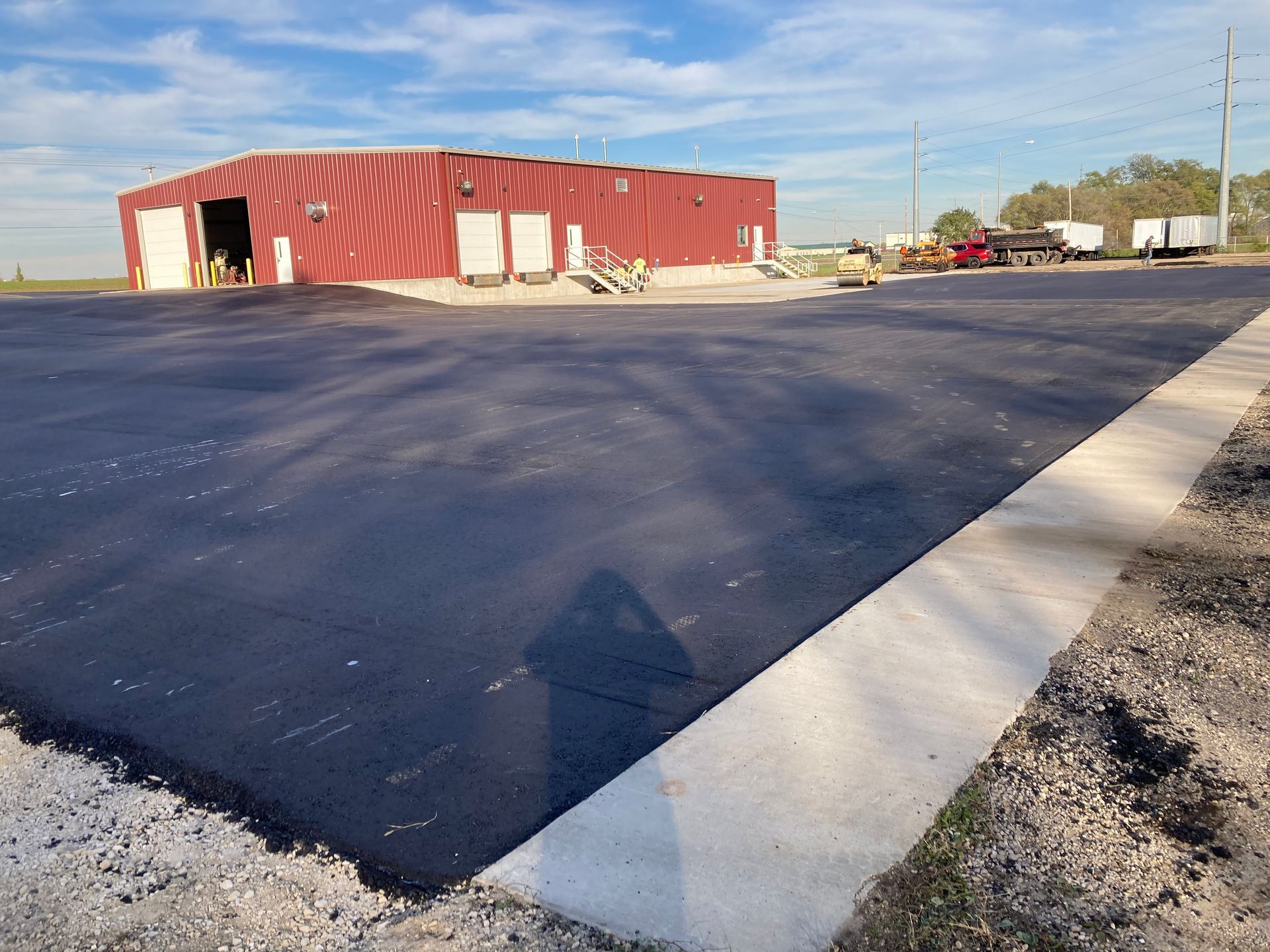 An Empty Parking Lot With White Lines On It - Capron, IL - Majestic Asphalt & Snow Services