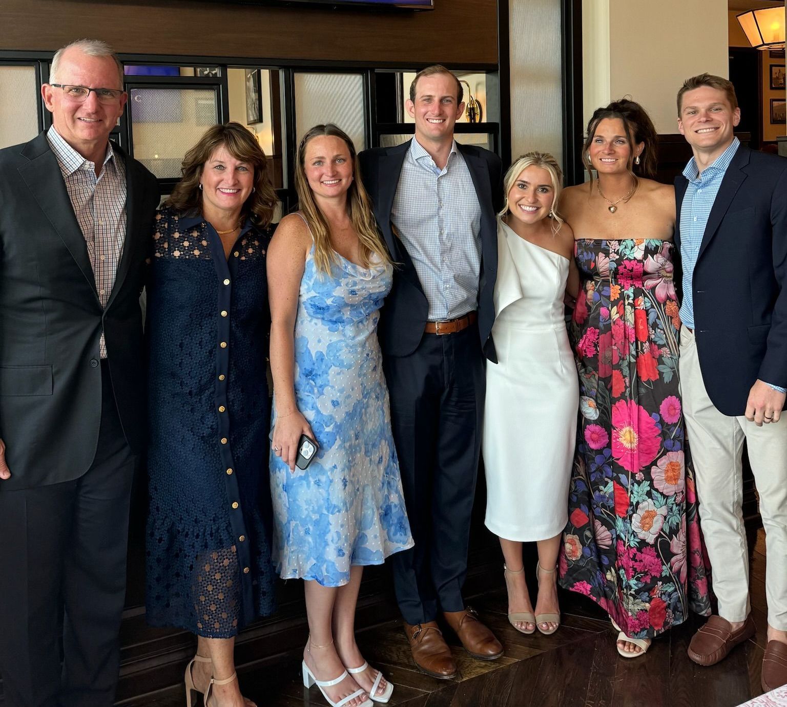 A group of people are posing for a picture together.