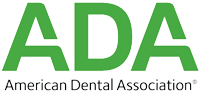 The logo for the american dental association is green and white.