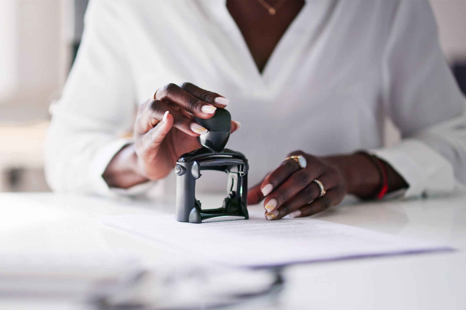 Putting Notary Stamp on Document