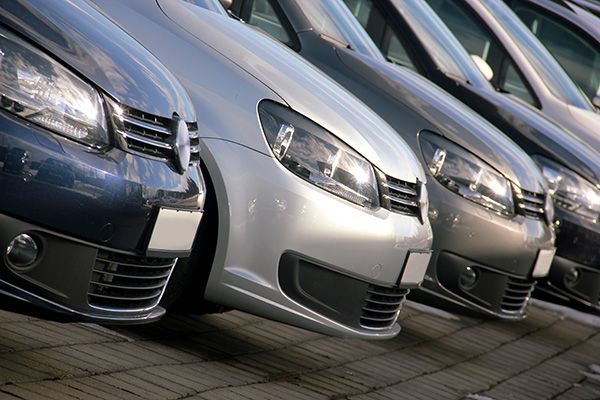 Cars parked in a row; varying shades of gray, blue, and silver. | Morin Brothers Automotive