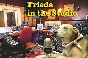 Dog in recording studio with microphone, text “Frieda in the Studio.” Studio equipment visible. | Morin Brothers Automotive