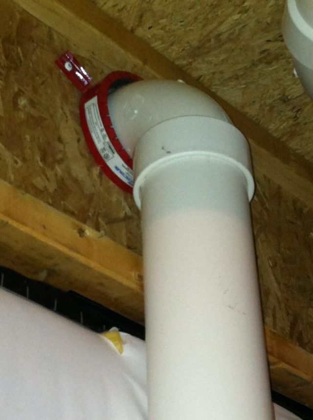 A White Pipe Surrounded by a Painted Red Metal - Youngstown, OH - Radon Raiders