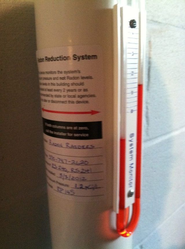 A White Pipe With a Sticker Label - Youngstown, OH - Radon Raiders